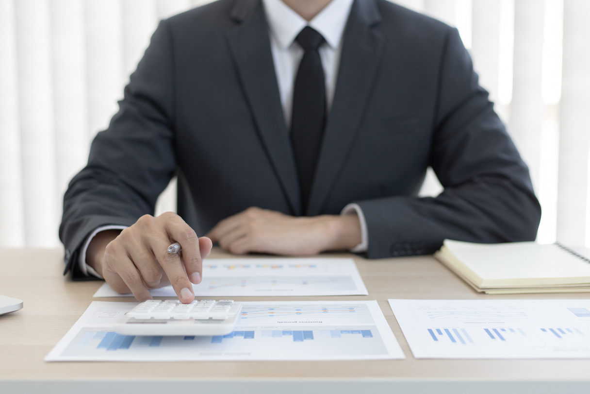 Businessman Working on Financial Report